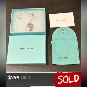 Beautiful Tiffany & Co. round pendant w/box pouch and bag. Limited Edition!